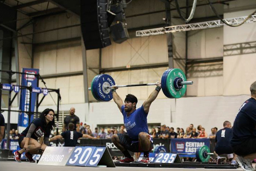 Two Time CrossFit Winner, Rich Froning, 3 reps of 305lbs Overhead Squats (©CrossFit, Inc)